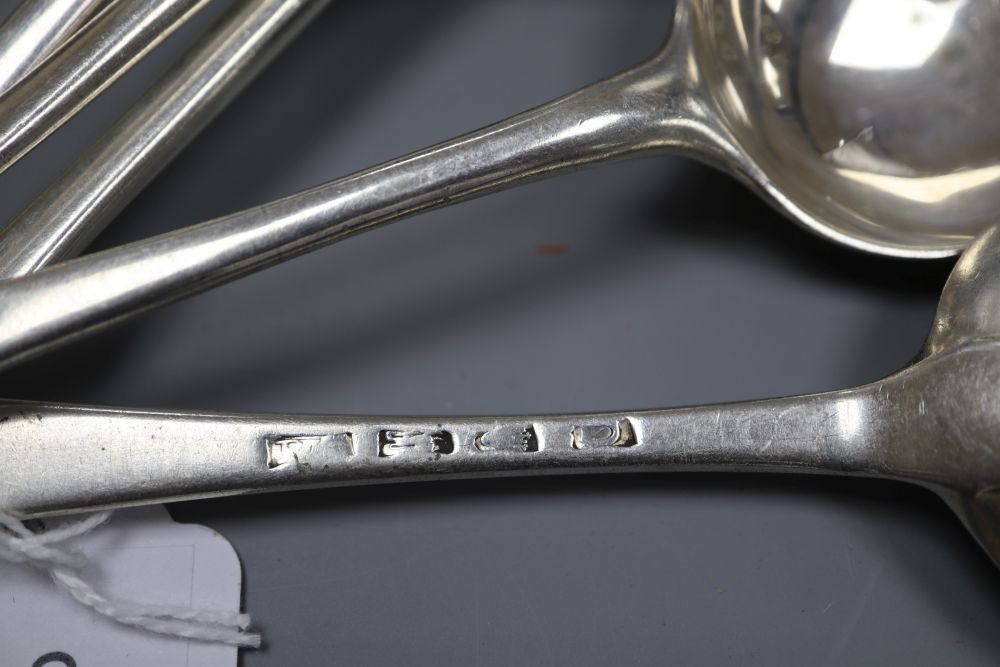 A pair of late George II silver Old English patter tablespoons, Nicholas Hearnden, London, 1759 and three other spoons.